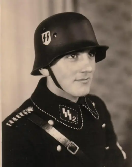 A man in uniform with a helmet and sword.