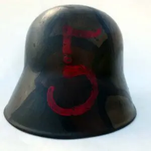 A black helmet with red lettering and number 5.