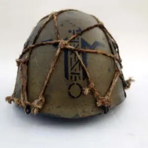 A helmet with rope wrapped around it.