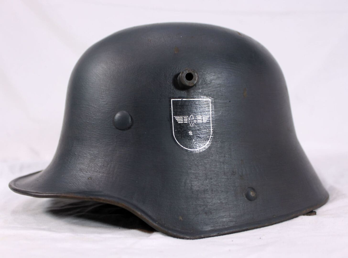 A black helmet with a patch on it