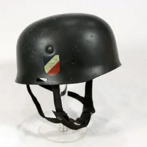 A black helmet with a red, white and green stripe on it.