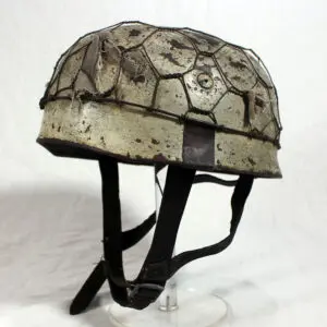 A helmet with a shell pattern on it.